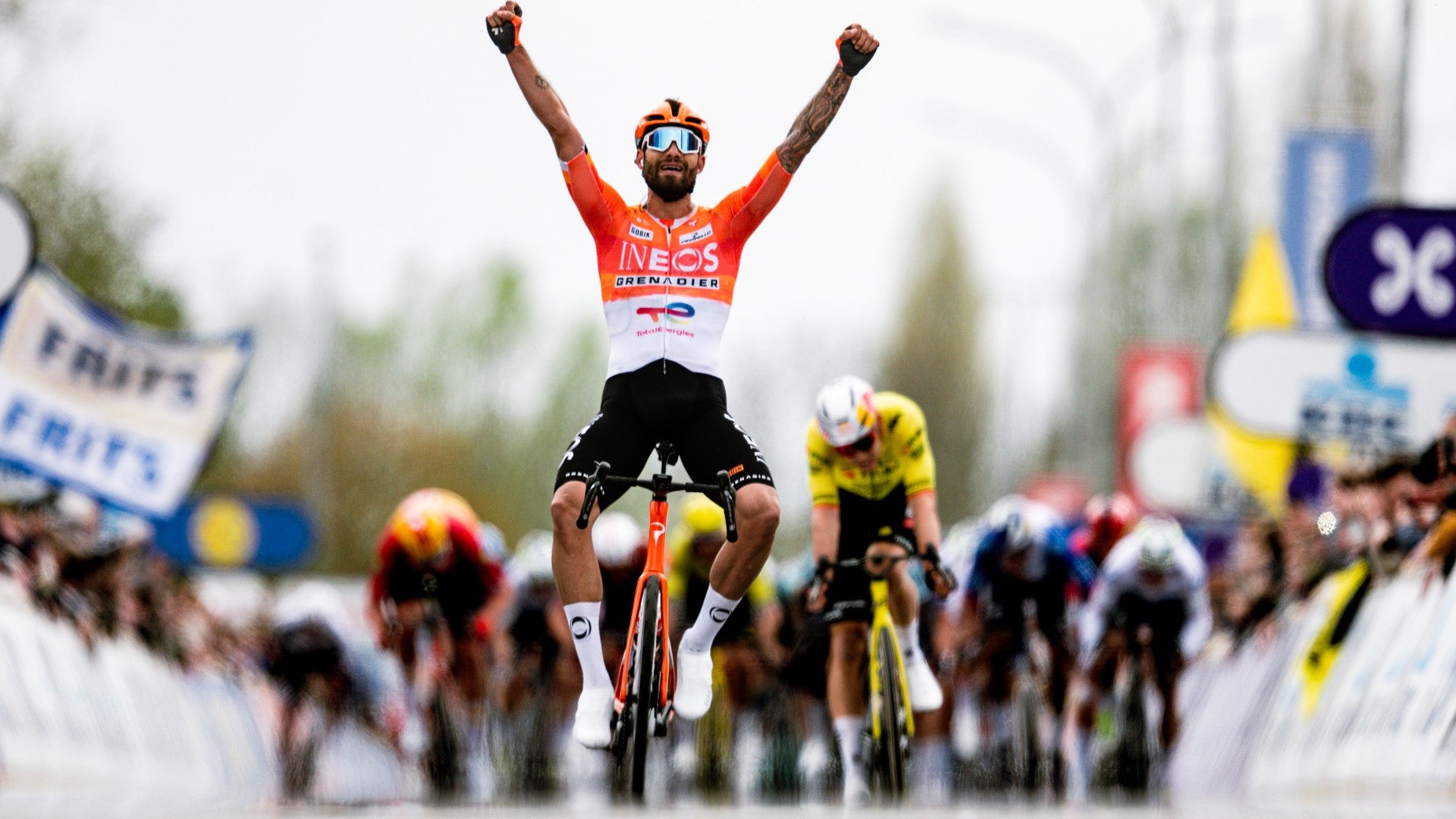 Professional cyclist Filippo Ganna winning Dwars Vlaanderen 2026 race on bike equipped with K-Edge cycling products